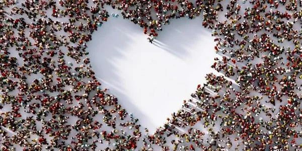 people making the shape of a heart