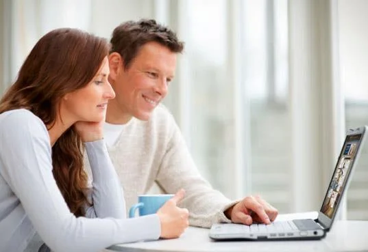 couple working on laptop together