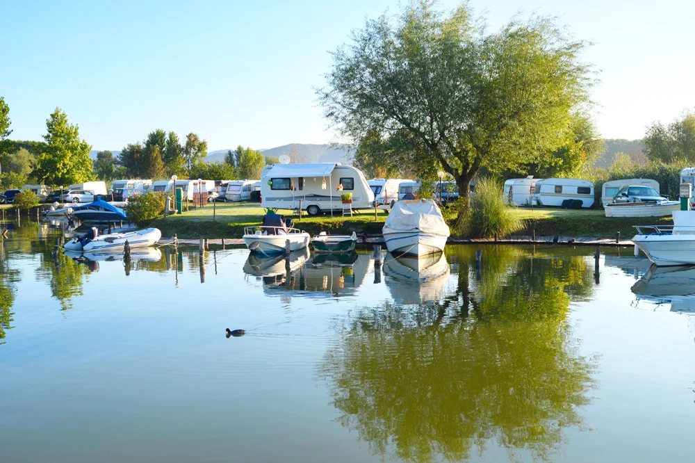 Campground with marina full of boats and RVs