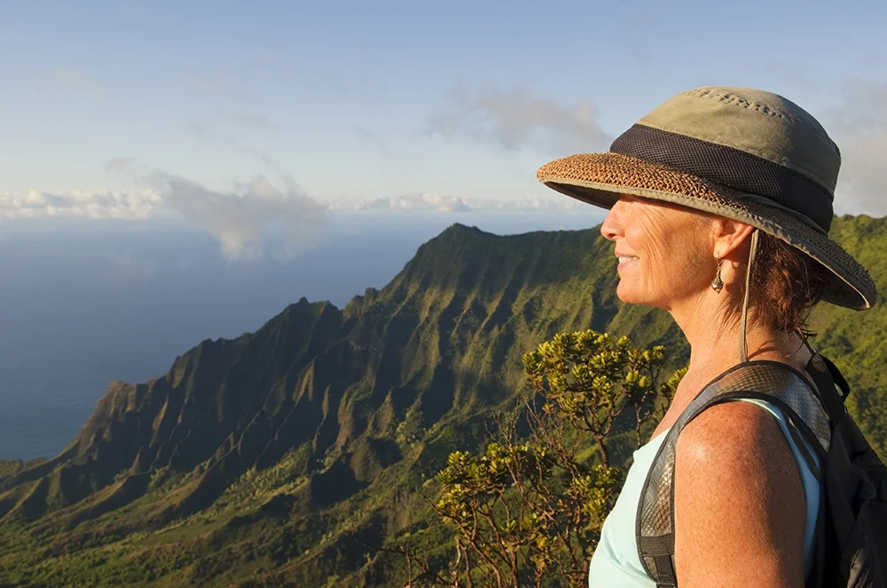 Woman looking at mountain in Hawaii
