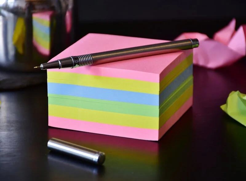 post-it notes and a pen